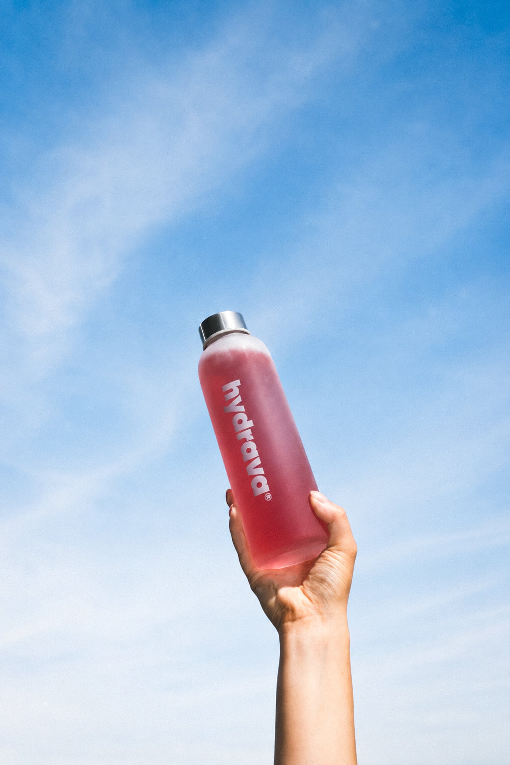 Hand holding a Hydrava bottle